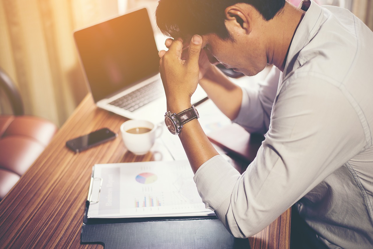 travel insurance claims stressed man