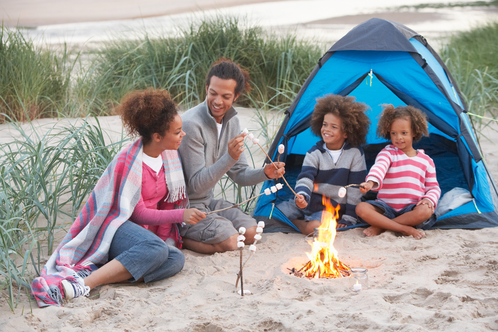 beach camping family smores