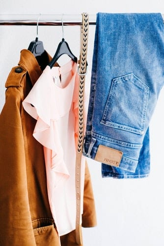 A pre-planned outfit: jeans, top, jacket, belt A pre-planned outfit: jeans, top, jacket, belt