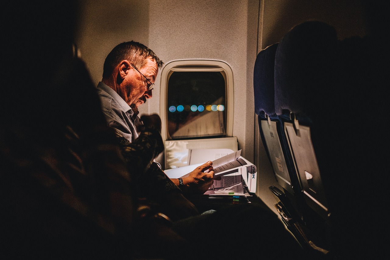 reading and keeping busy are great tips for surving long flights reading and keeping busy are great tips for surving long flights