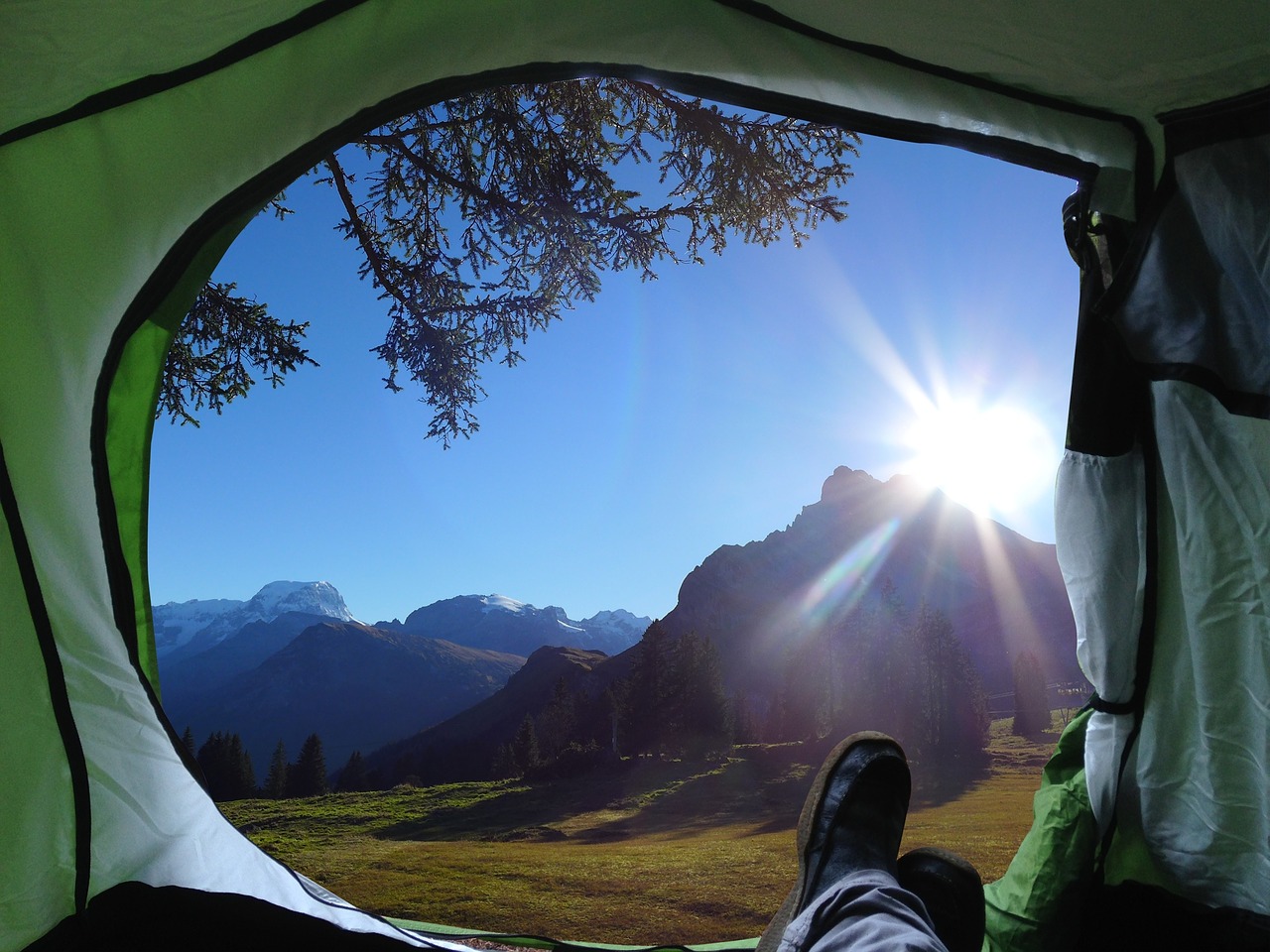 view of the mountains from a tent