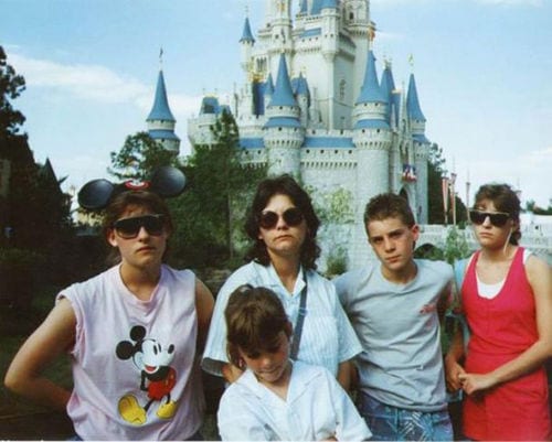 family looking really unhappy about their vacation to disneyland