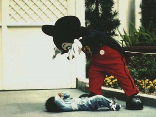 mickey mouse scaring a child