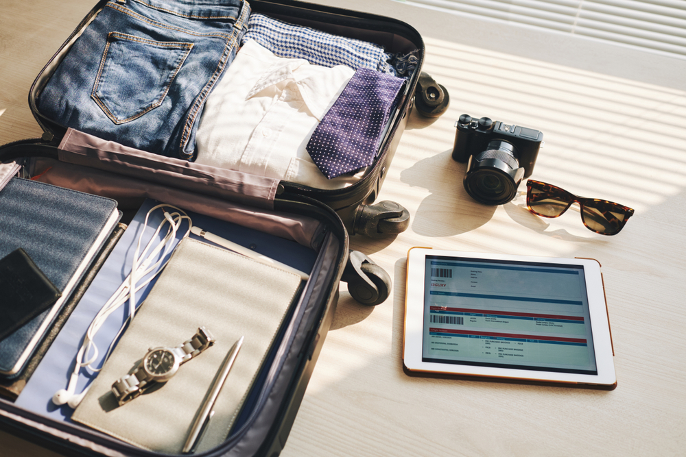 packing hacks for business travelers open suitcase
