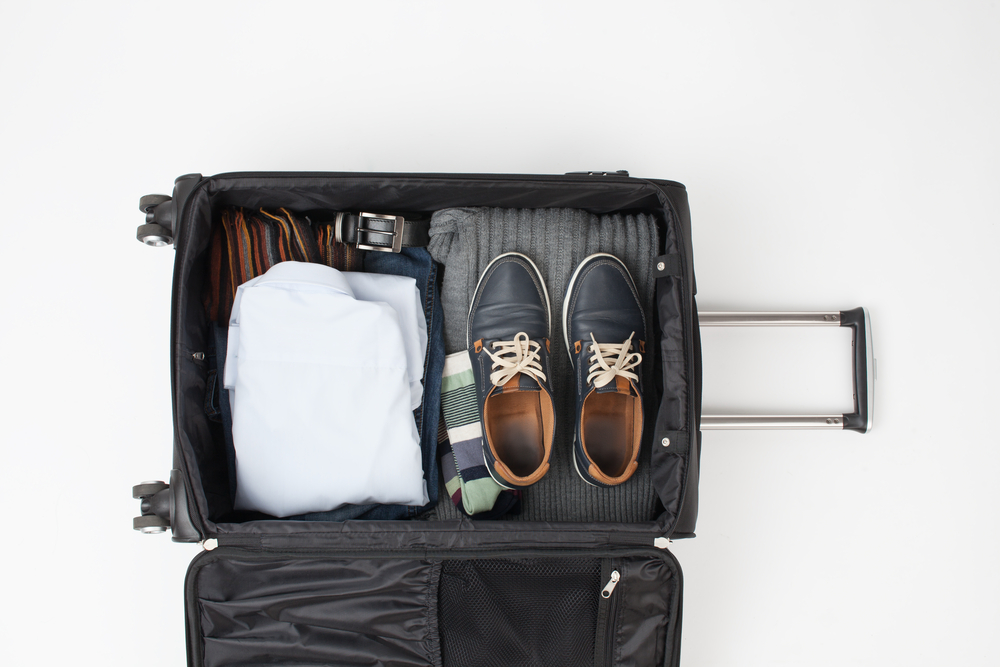 packing hacks for business travelers suitcase open