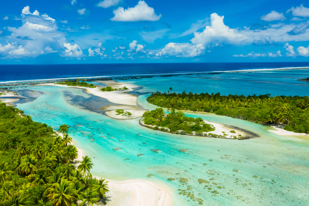Rangiroa aerial drone video of atoll island motu and coral reef in French Polynesia