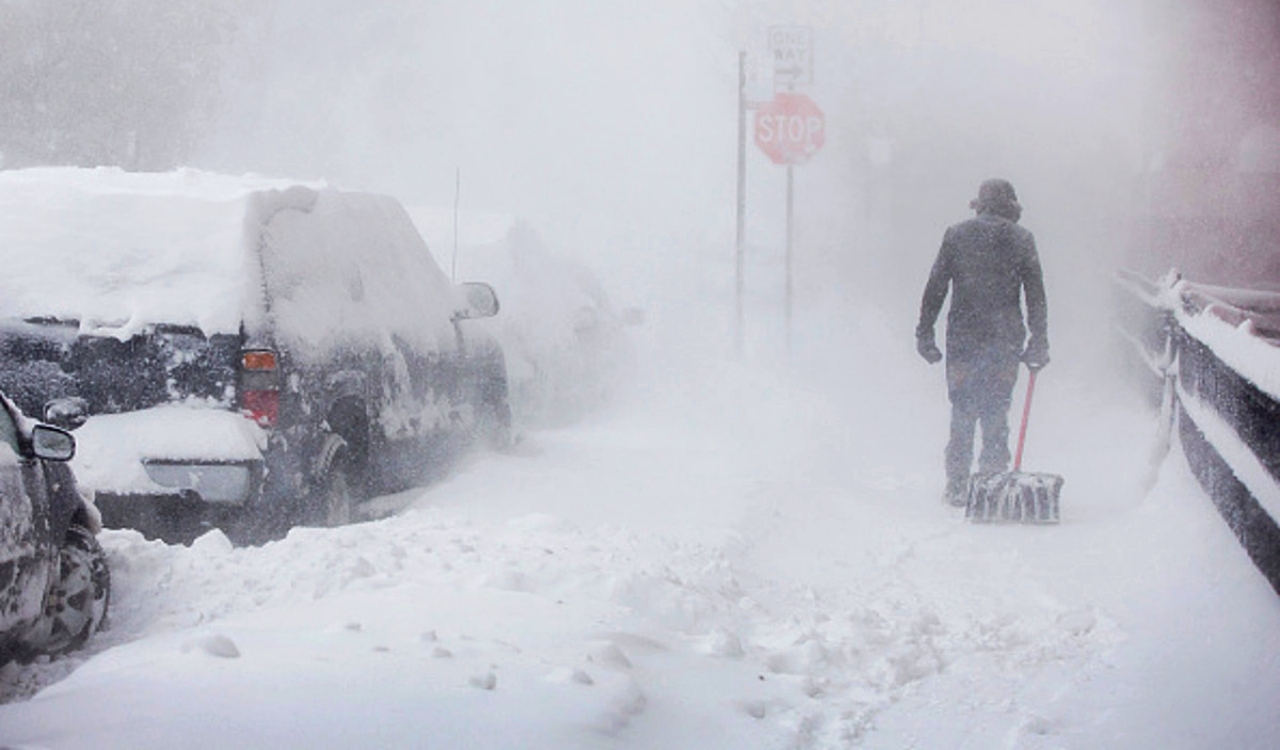 Winter Storm Elliot - Man In Snow