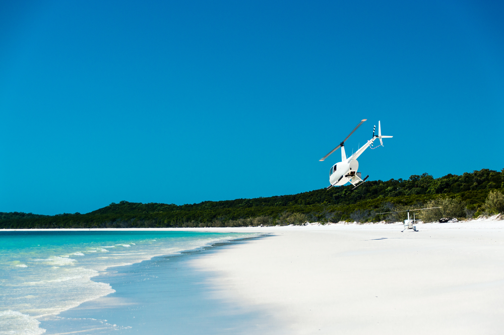 Helicopter,Taking,Off,From,Whitehaven,Beach,,Australia.,Whitehaven,Beach,Has
