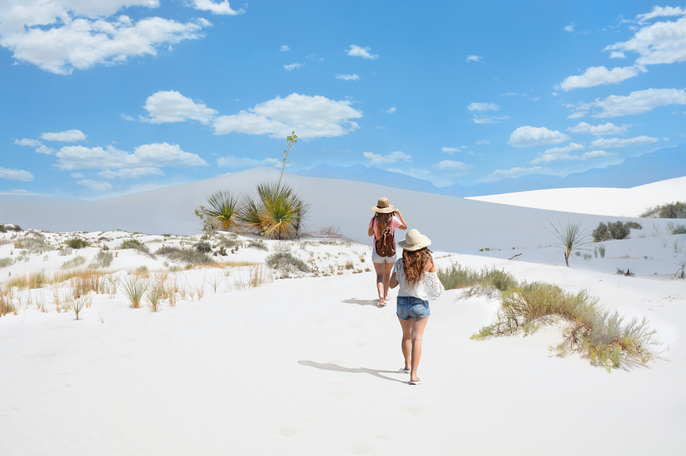 Girls,On,Hiking,Trip,On,The,Mountain,Desert,,Blue,Sky