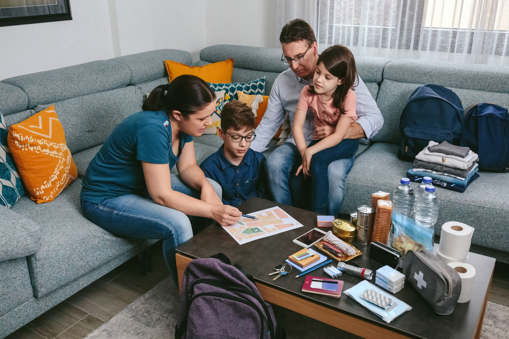 Mother,Explaining,To,Her,Family,The,Assembly,Point,Map,While