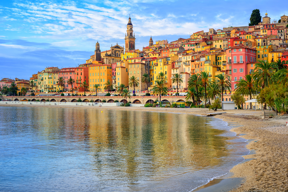 Sand,Beach,Beneath,The,Colorful,Old,Town,Menton,On,French