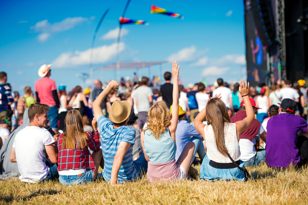 teens listening to concert